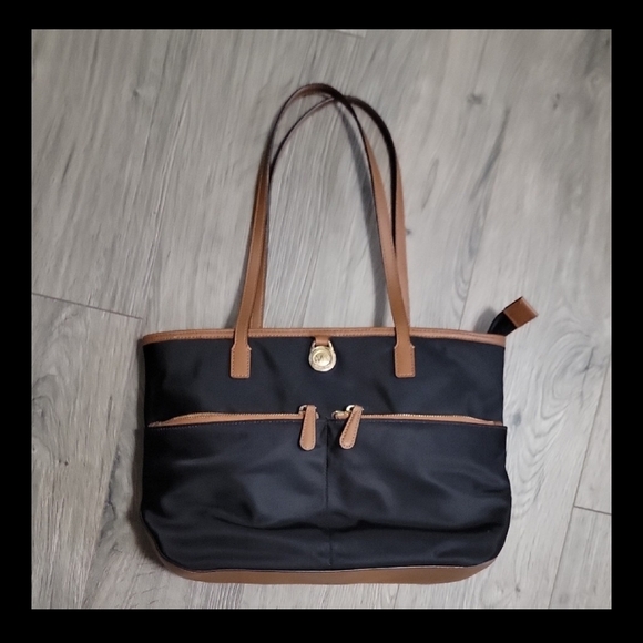 Michael Kors Handbags - Michael Kors Black and Tan Tote Bag with Elegant Design